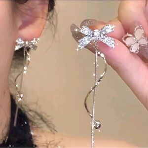 Dazzling Silver Bow Drop Earrings